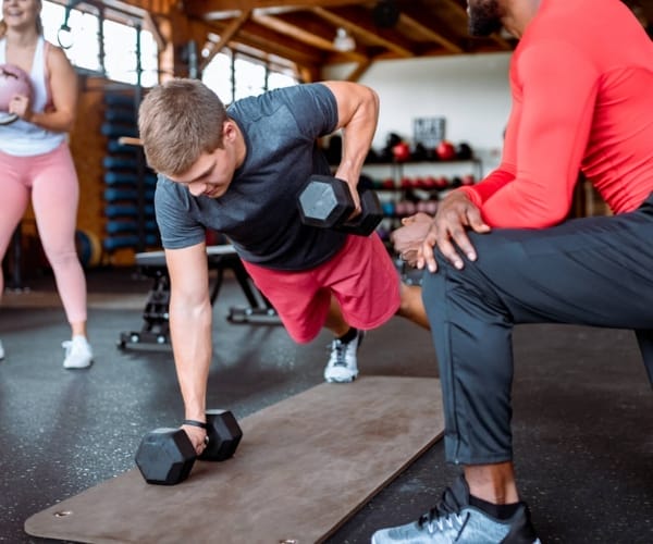 dumbbell work in teen fitness classes in raleigh, nc