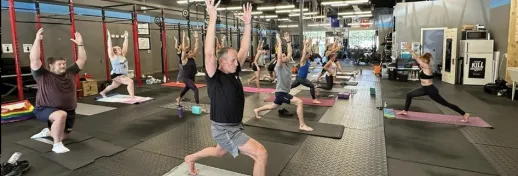 Triangle CrossFit Everyone with raised arms